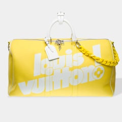 Louis Vuitton Keepall 50 Travel bag strap in yellow grained leather, PHW