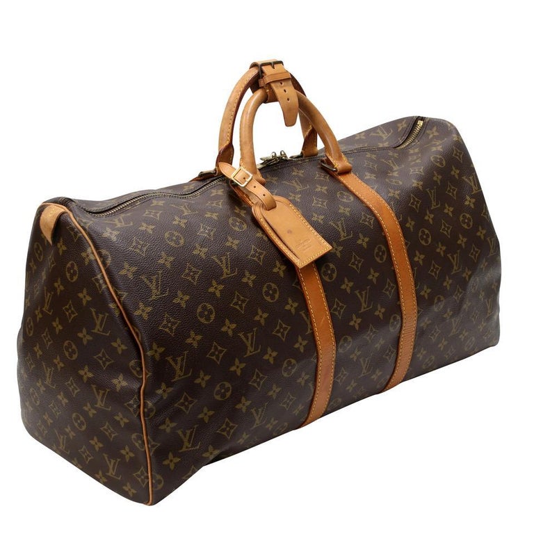 Louis Vuitton Keepall 55 Monogram Canvas Travel Bag LV-0829N-0002

The Louis Vuitton Keepall 55 Cross Body is the perfect travel bag for any trip or adventure! With plenty of room to store clothes, make up, or anything you want, this bag has you