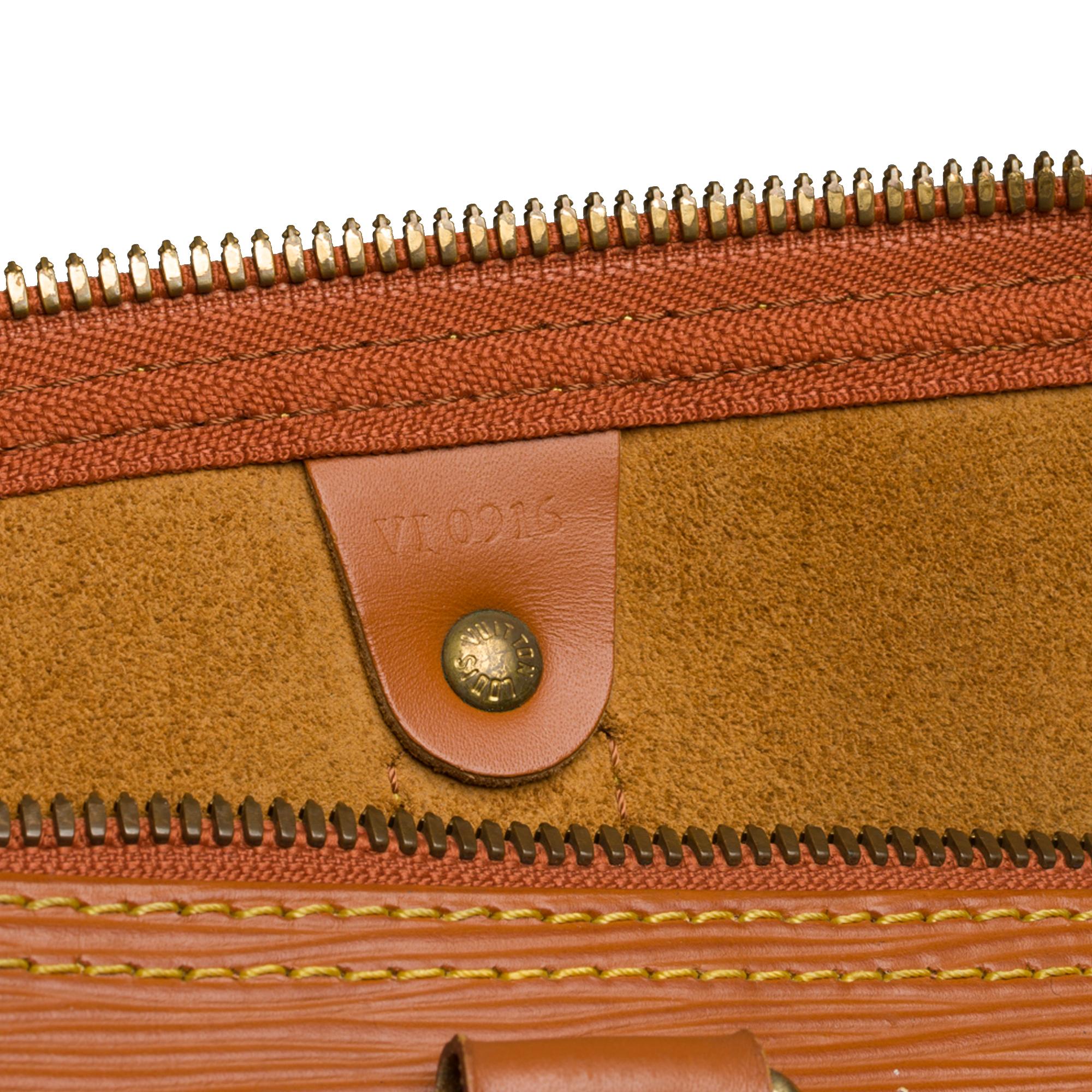 Louis Vuitton Keepall 55 Travel bag in cognac épi leather 1