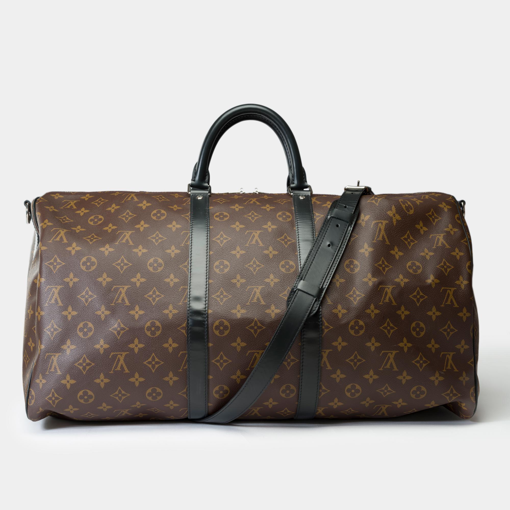 Very​ ​Chic​ ​Louis​ ​Vuitton​ ​Keepall​ ​55​ ​Travel​ ​bag​ ​strap​ ​in​ ​brown​ ​Macassar​ ​canvas​ ​and​ ​brown​ ​leather​ ​shoulder​ ​strap,​ ​silver-tone​ ​metal​ ​trim,​ ​double​ ​black​ ​leather​ ​handle,​ ​adjustable​ ​removable​ ​black​