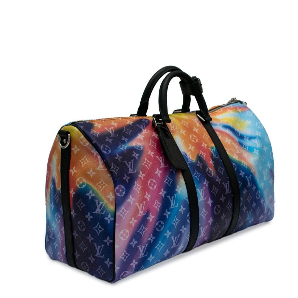 Louis Vuitton Virgil Abloh Multicolour Sunset Monogram Keepall Bandoulière 50 Silver Hardware, 2021. Handle: 12cm.

- This bag is lined in black canvas.
- This bag was featured during the 2021 collection Sunset Monogram artwork designed by Daniel