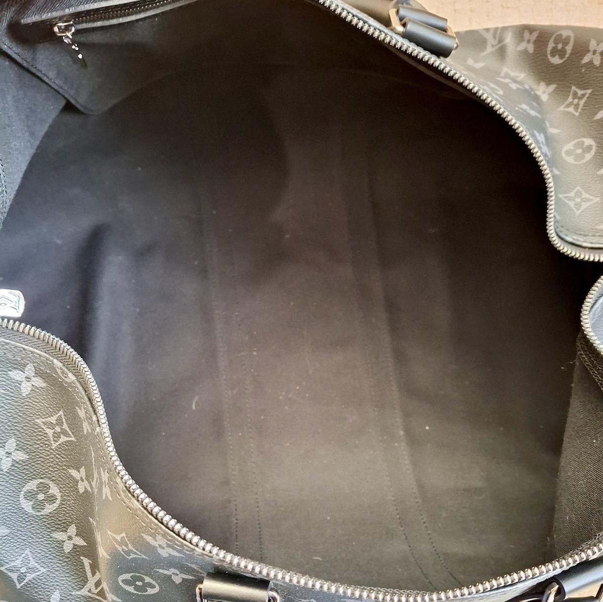 Cowhide Louis Vuitton Keepall Bandoulière 55 in Monogram Eclipse Canvas For Sale