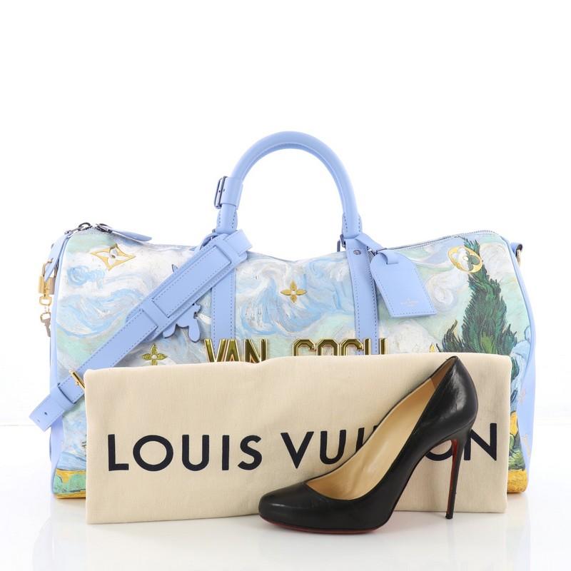This authentic Louis Vuitton Keepall Bandouliere Bag Limited Edition Jeff Koons Van Gogh Print Canvas 50 is twisted with refinement and femininity through exclusive know-how. Crafted from printed coated canvas, this luxurious travel-sized duffle