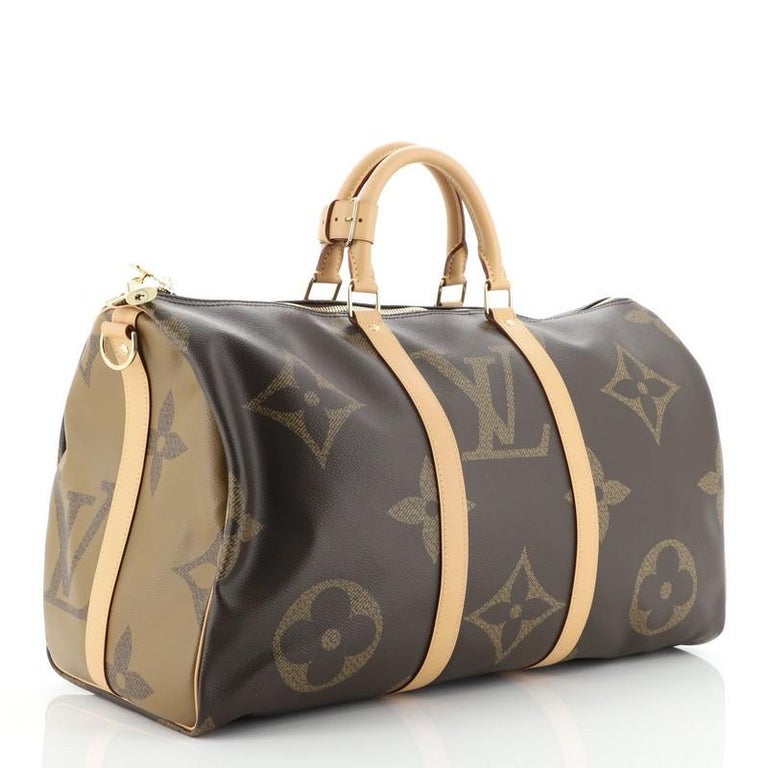 Louis Vuitton Keepall Bandouliere Monogram Giant Reverse 50 Brown in Coated  Canvas