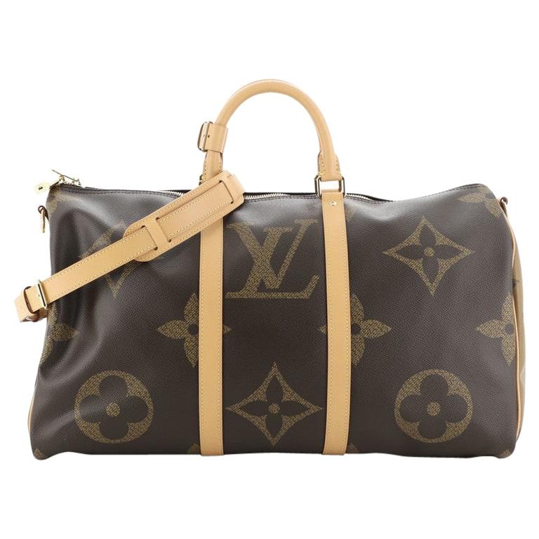 https://a.1stdibscdn.com/louis-vuitton-keepall-bandouliere-bag-limited-edition-reverse-monogram-giant-50-for-sale/1121189/v_100215621596097207531/10021562_master.jpg