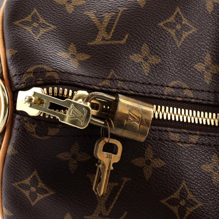 Louis Vuitton Keepall Bandouliere Bag Monogram Canvas With Coquelicot  Leather Trim 50 Auction