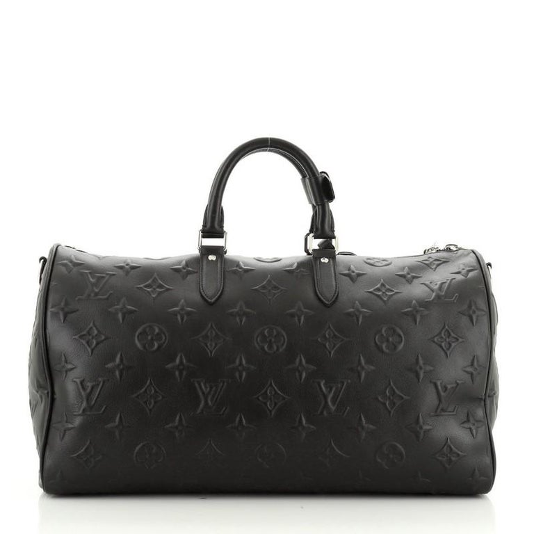 Louis Vuitton Monogram Revelation Bag