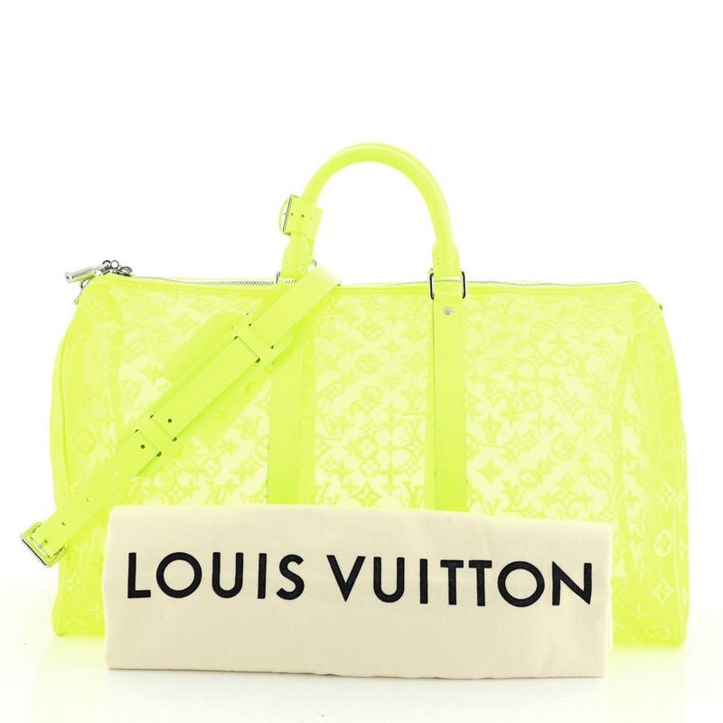 This Louis Vuitton Keepall Bandouliere Bag Monogram See Through Mesh 50, crafted in yellow mesh monogram, features dual leather handles, leather trims and silver-tone hardware. Its zip closure opens to a yellow fabric interior. Authenticity code