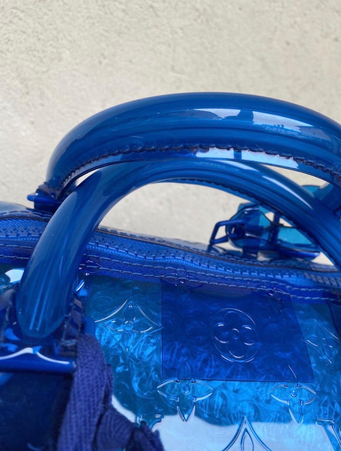 Louis Vuitton Keepall Bandoulière Monogramme 50  Sac à bandoulière en pvc bleu en vente 1