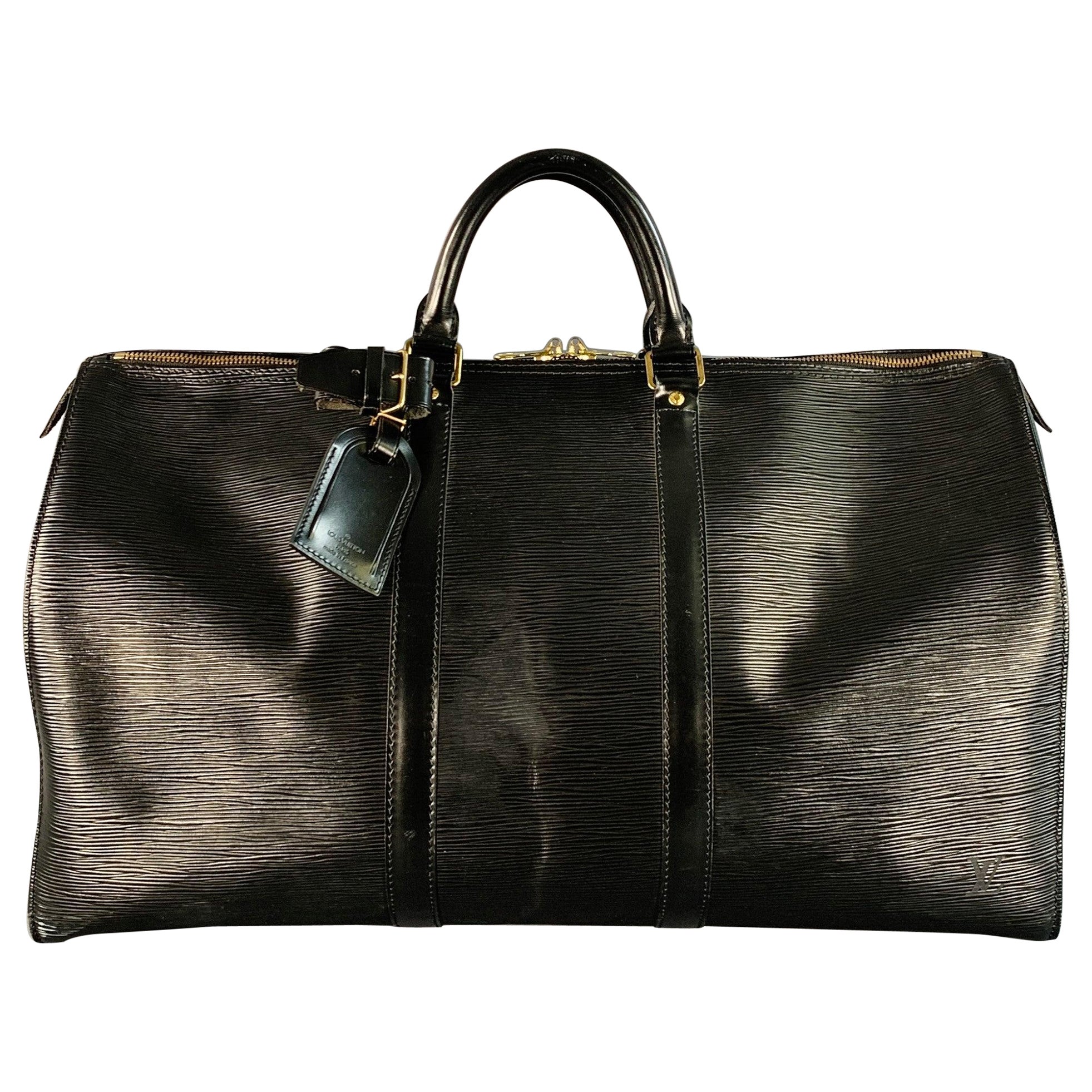 LOUIS VUITTON - Keepall - Sac de sport en cuir épi noir en vente