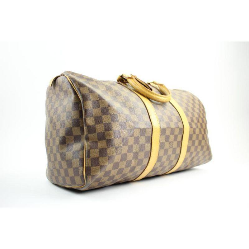  Louis Vuitton Keepall ( Extremely Rare ) Nigo Centenaire Damier Ebene 50 107lva129 Brown Coated Canvas Weekend/Travel Bag
This item will ship immediately!!
 Previously owned.
 Date/style Code: SP0996
 Made In: France
 Measurements: Length: 18.5