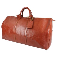 Louis Vuitton Keepall Weekend Bag in Leather and Gold Hardware