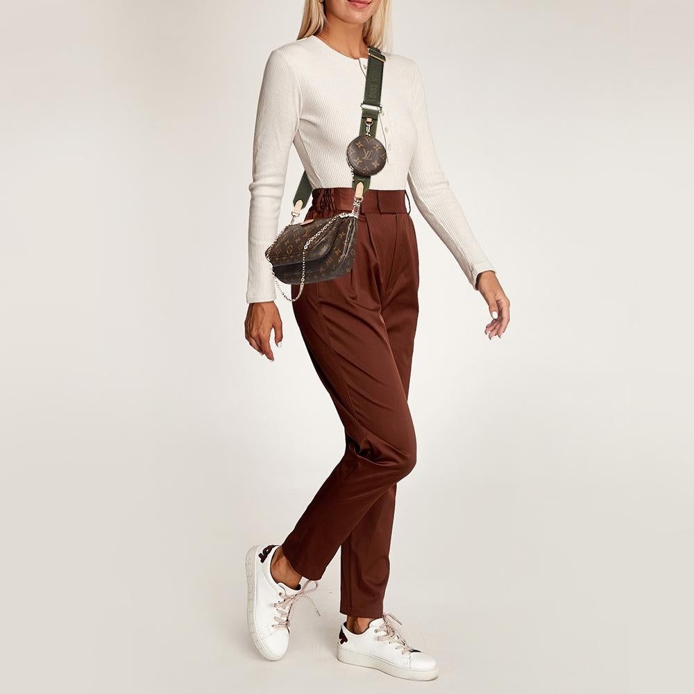 Louis Vuitton's Multi Pochette Accessoires is a result of merging the brand's loved Pochette Accessoires with a Pochette Accessoires and a circular coin purse. Crafted using monogram canvas, the bag can be held by the gold-tone chain or long strap.