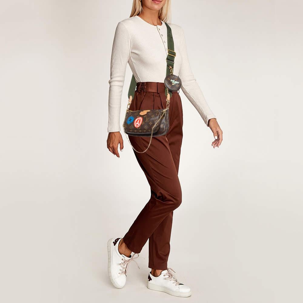 Louis Vuittons Multi Pochette Accessoires is a result of merging the brands loved Pochette Accessoires with a mini sized Pochette Accessoires and a circular coin purse. Crafted using monogram canvas the bag can be held by the gold tone chain or the