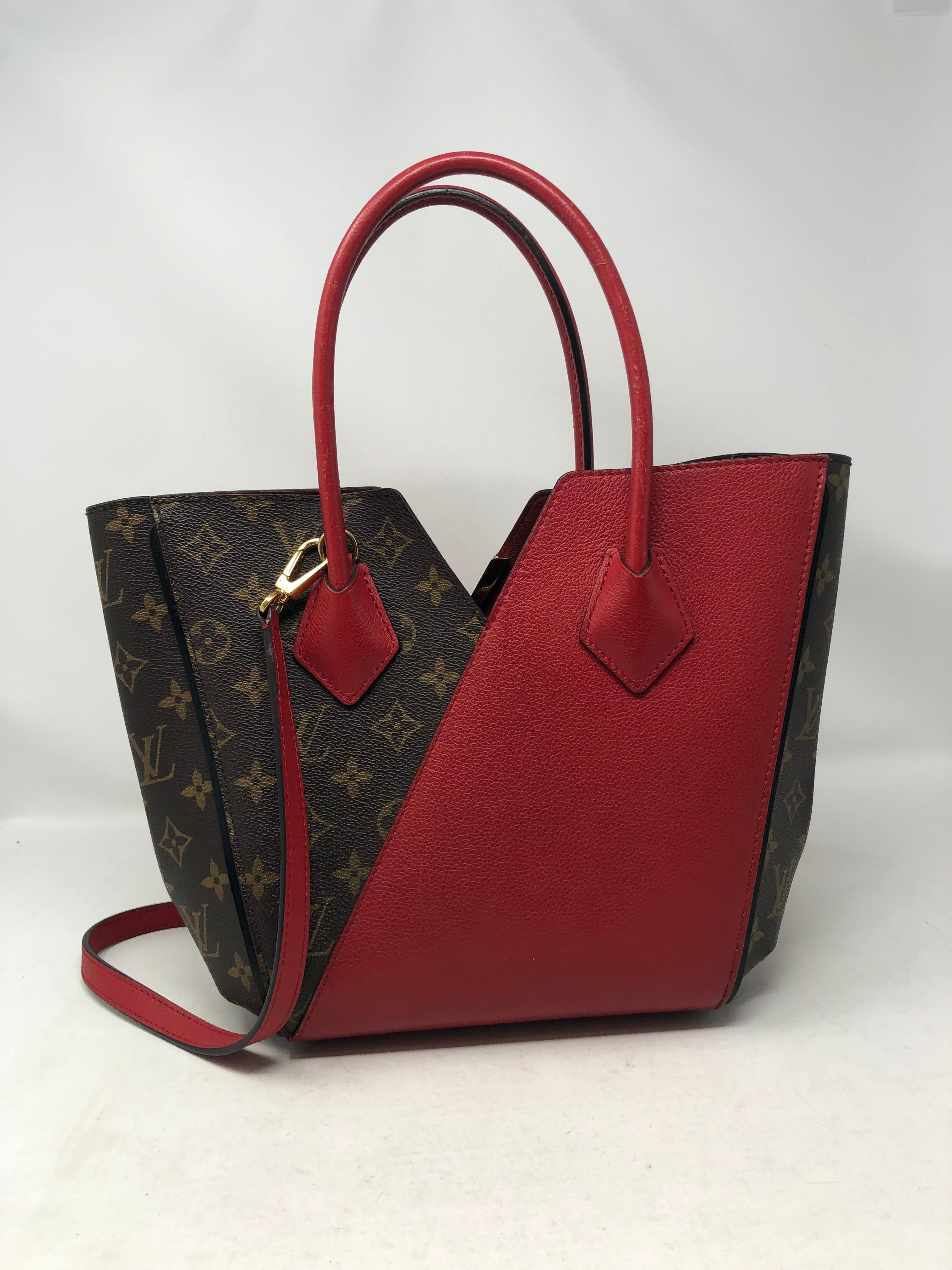 Louis Vuitton Kimono Bag with extra strap. Can be worn cross the body. Beautiful combination of red leather and monogram. Limited and rare. A few marks inside. Exterior is in good condition. Guaranteed authentic. 