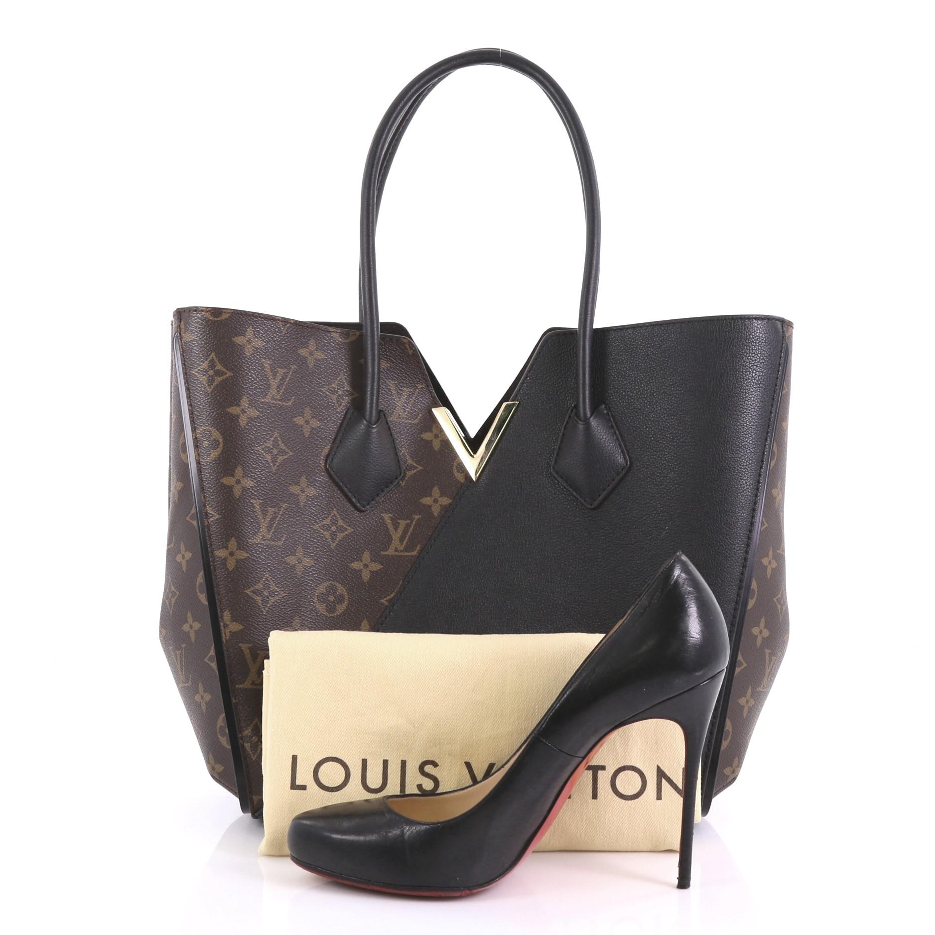 This Louis Vuitton Kimono Handbag Monogram Canvas and Leather MM, crafted from brown monogram canvas and black leather, features dual rolled top handles, a metallic V-cross accent, and gold-tone hardware. Its wide top with hook-clasp closure opens