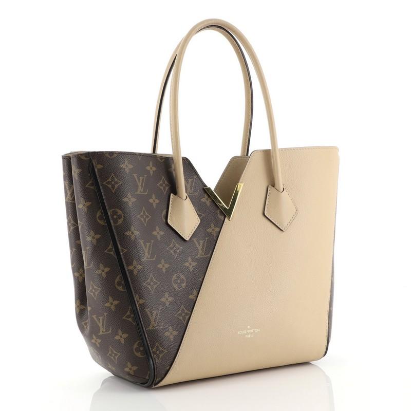 This Louis Vuitton Kimono Handbag Monogram Canvas and Leather MM, crafted from brown monogram coated canvas and neutral leather, features dual rolled handles, metallic V-cross accent, and gold-tone hardware. Its wide top with hook-clasp closure