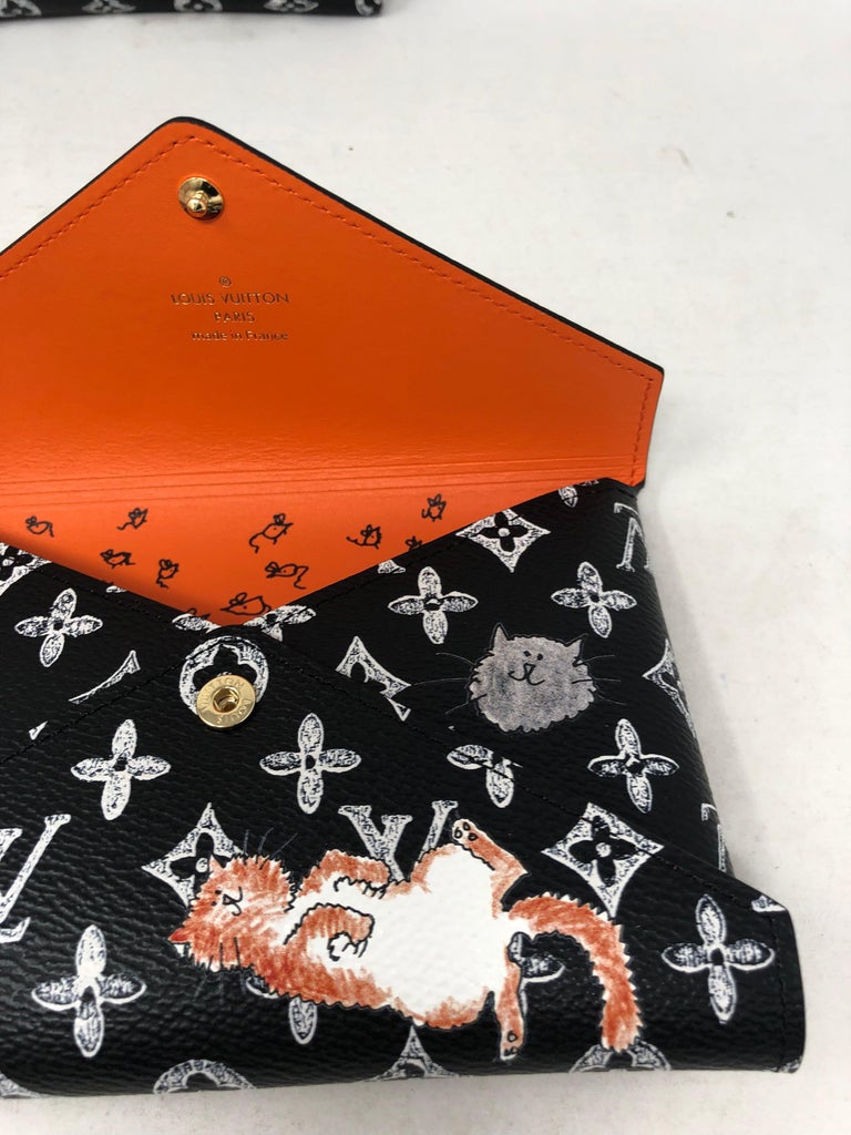 Louis Vuitton Limited Edition Marron/Orange Catogram Canvas Grace  Coddington Kirigami Pouch Set - Yoogi's Closet