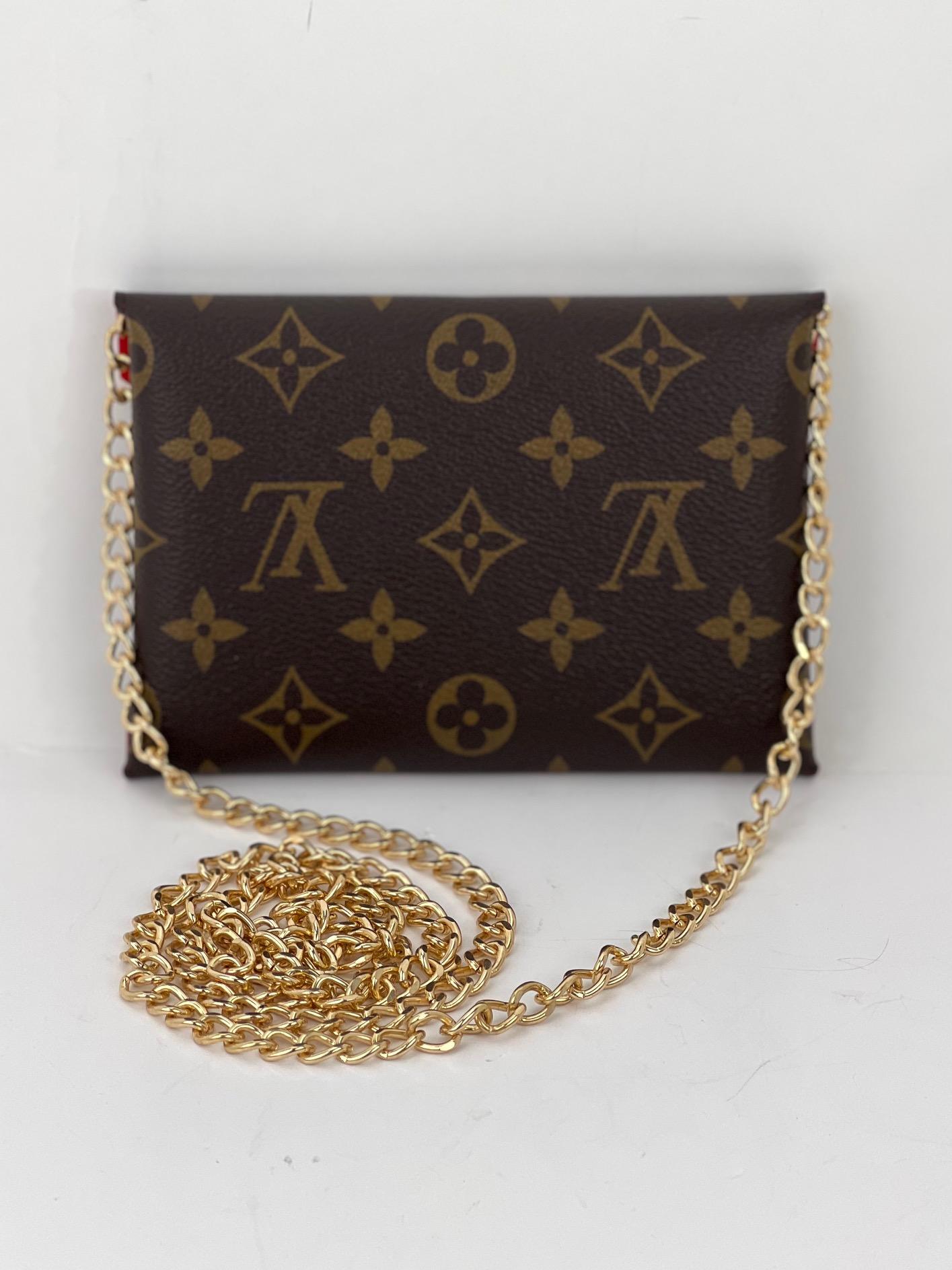 Preowned BUT like New 100% Authentic
LOUIS VUITTON Kirigami Pochette Red Medium
W/Added Non LV Insert & Chain to make a Crossbody
RATING: A+...Excellent, near mint
MATERIAL: Monogram canvas
STRAP: Non LV Golden Strap 47'' long
HANDLE: none
DROP: