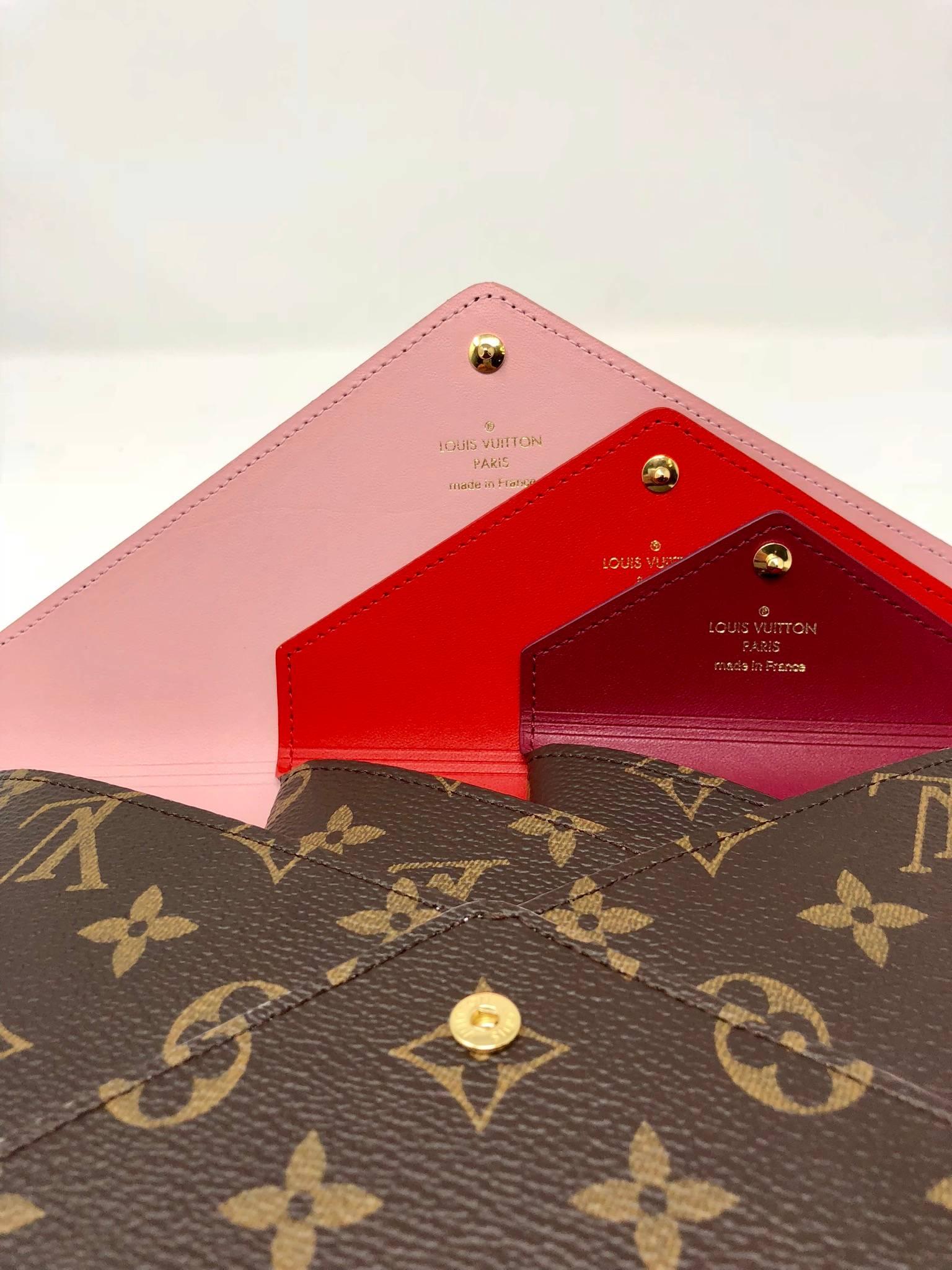 Louis Vuitton Kirigami Set. This set comes with three pouches ranging in sizing. The largest pouch has a light pink interior, the medium size has a red interior, and the smallest has a burgundy interior. This item is in pristine condition and