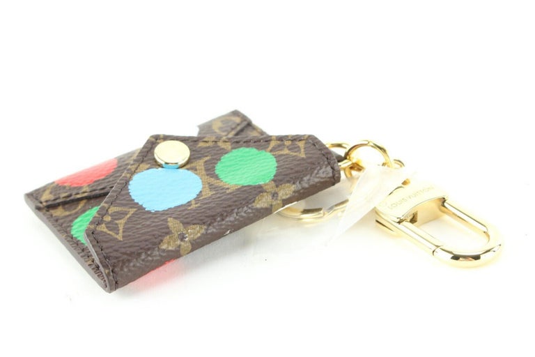 Louis Vuitton monogram alma key ring bag charm key holder brown