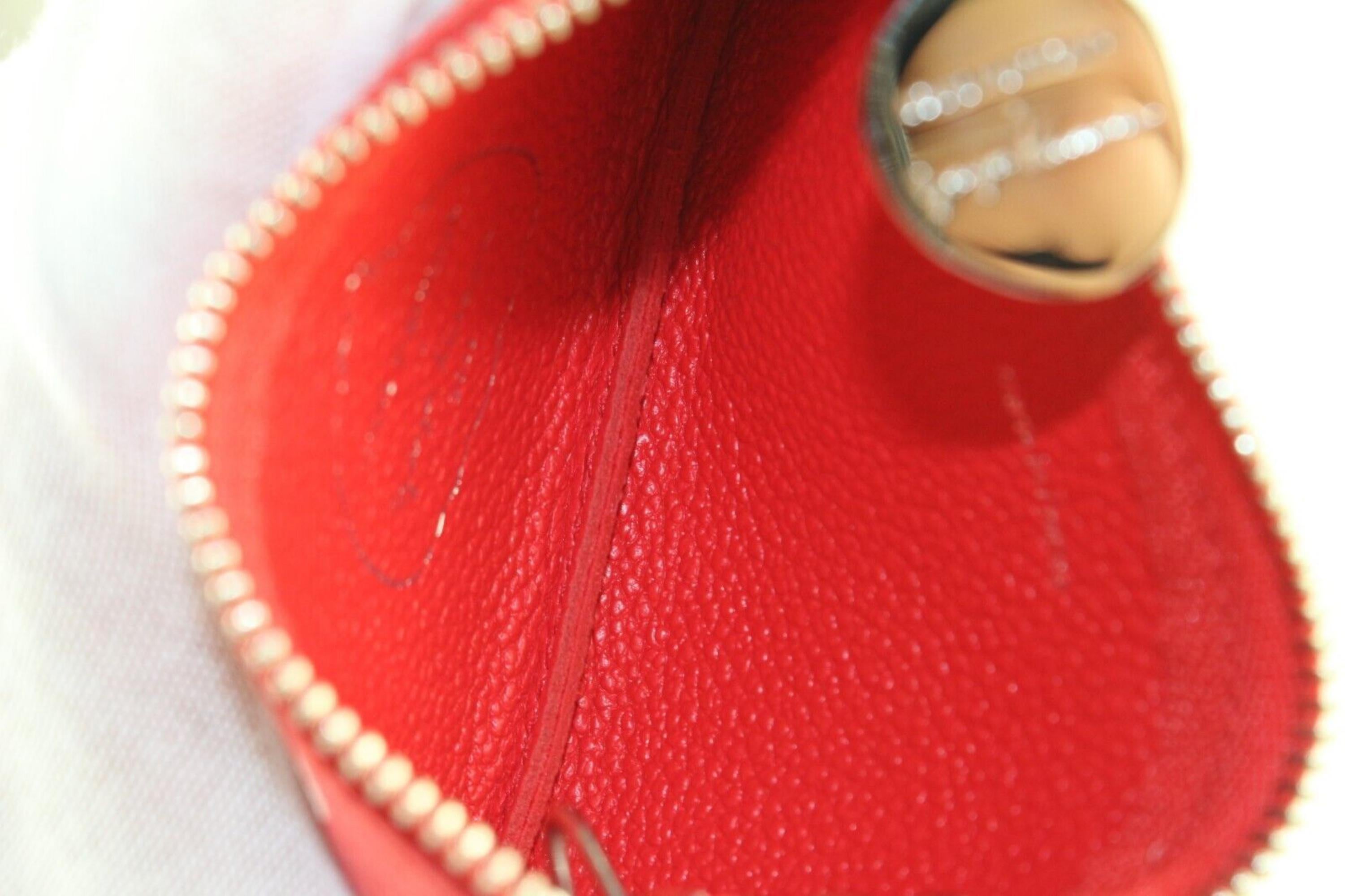 Empreinte Schlüsselanhänger aus rotem Leder mit Monogramm von Louis Vuitton 5LK0216 (Orange) im Angebot