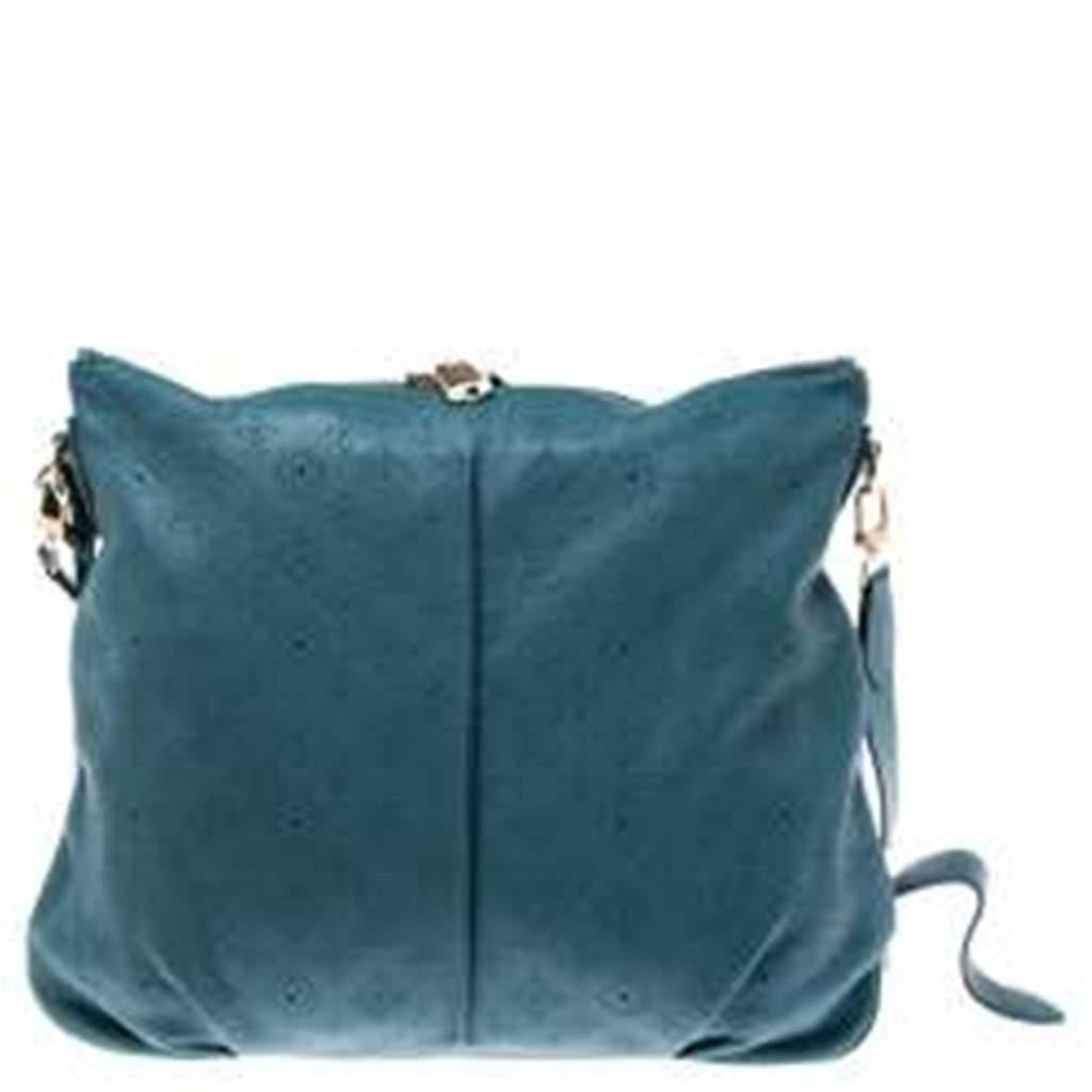 Crafted from Mahina leather, this Selene bag from Louis Vuitton features the famous monogram all over. The bag comes in a relaxed shape with a detachable shoulder strap. The zip-top closure opens to an Alcantara-lined interior that houses a zip