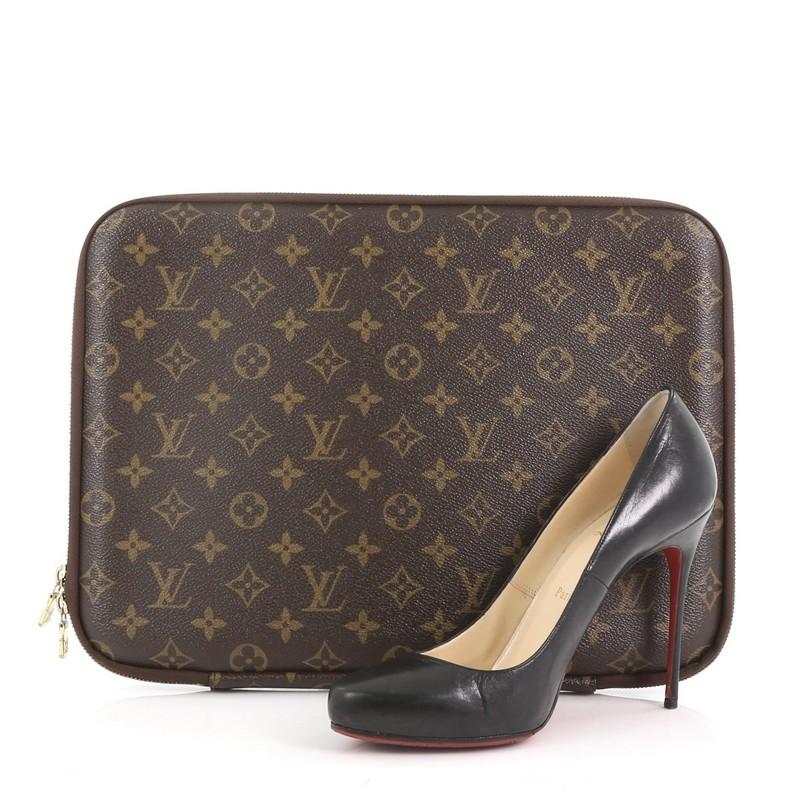 This Louis Vuitton Laptop Sleeve Monogram Canvas 13, crafted in brown monogram coated canvas, features Louis Vuitton Inventeur signature inside and gold-tone hardware. Its zip closure opens to a beige microfiber interior. Authenticity code reads: