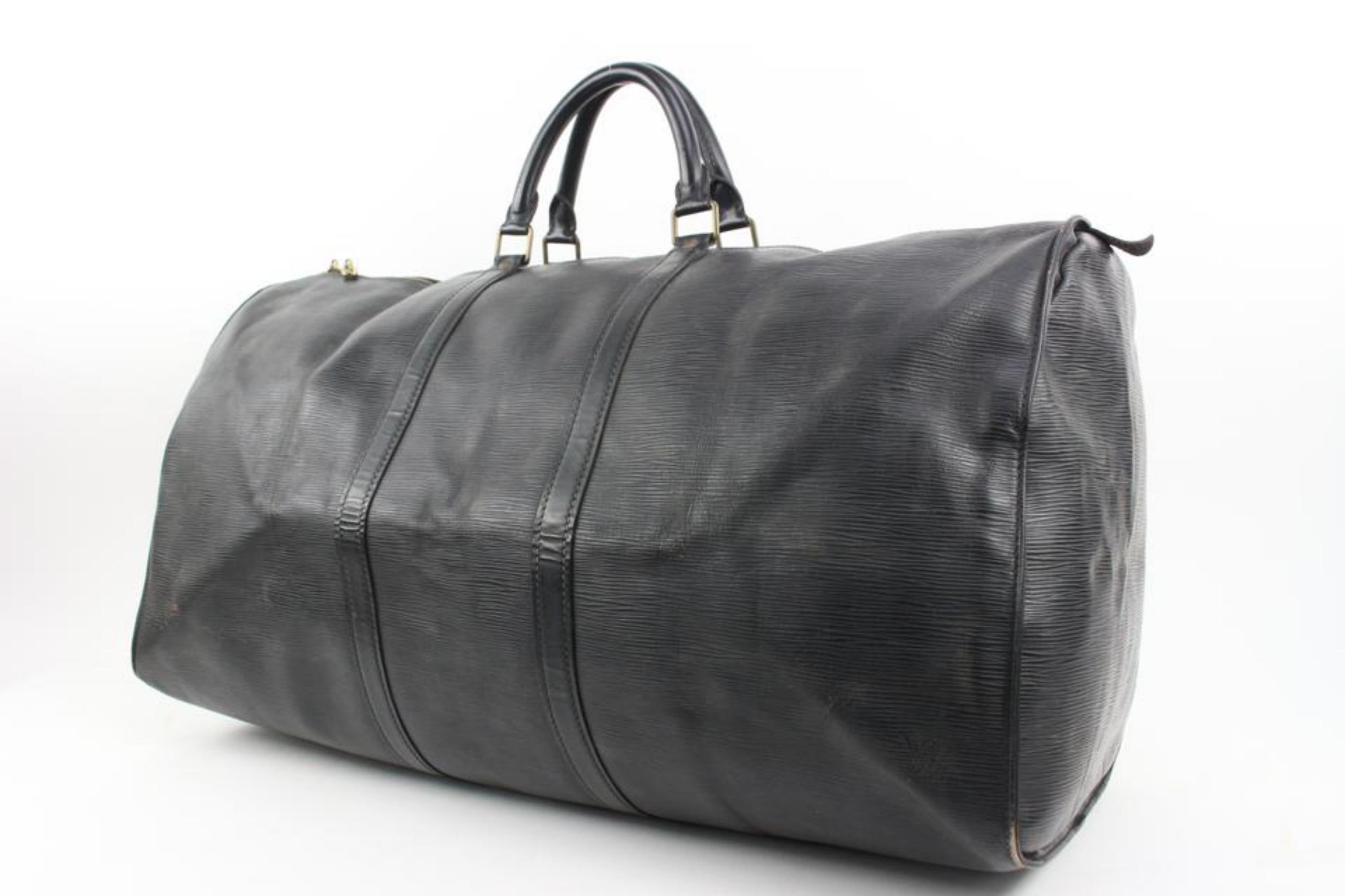Louis Vuitton Large Black Epi Leather Keepall 55 61lv218s
Date Code/Serial Number: VI872
Made In: France
Measurements: Length:  24