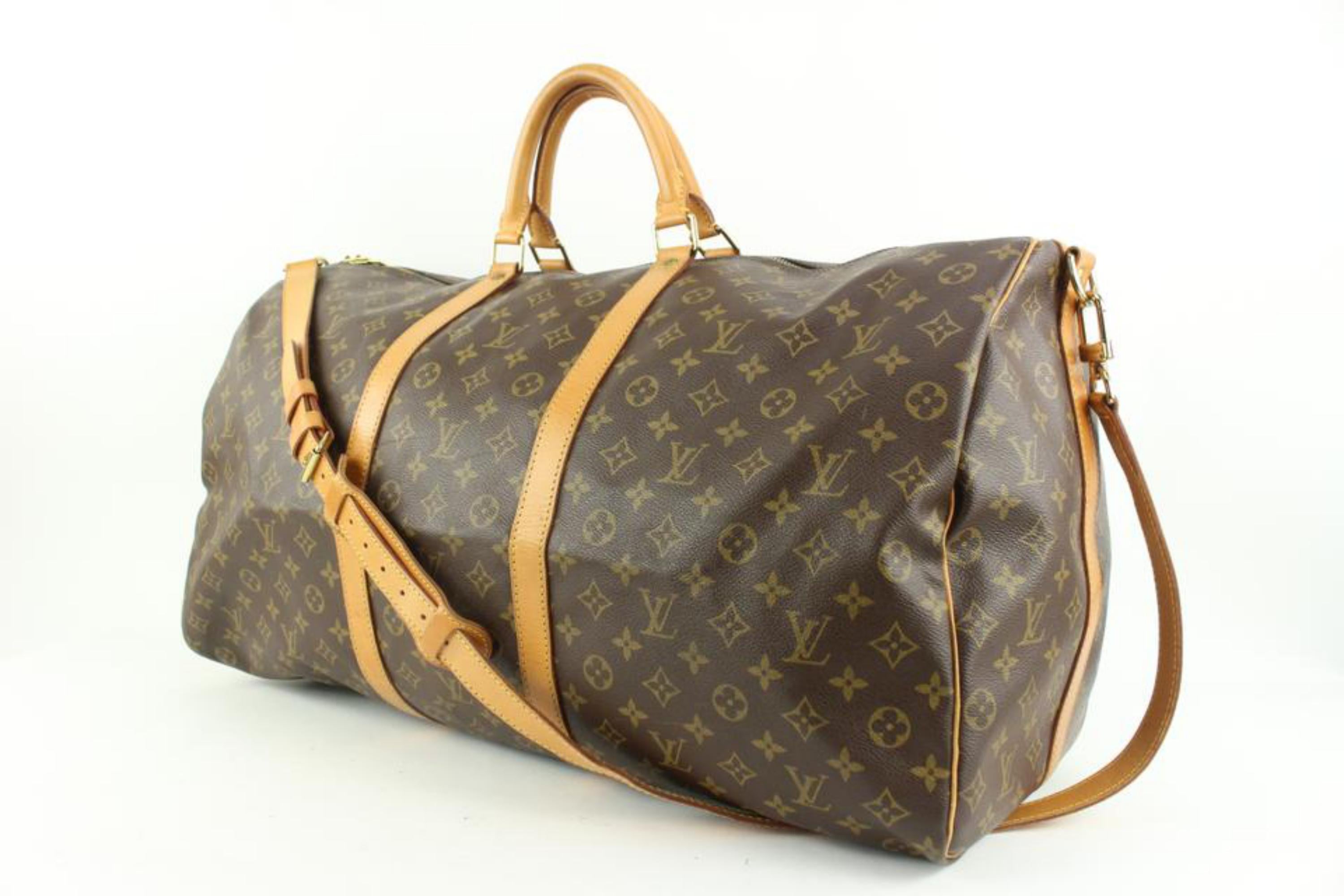 Louis Vuitton Large Monogram Keepall Bandouliere 60 Duffle with Strap 110lv55
Date Code/Serial Number: VI0954
Made In: France
Measurements: Length:  23.5