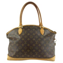 LOUIS VUITTON  BLACK LOCKIT TOTE BAG IN SHEARLING WITH PATENT AND