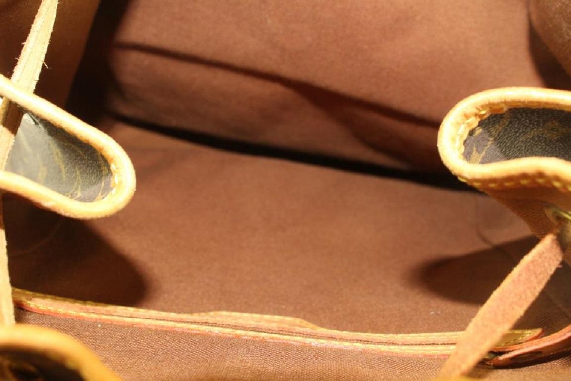 louis vuitton backpack gold plate