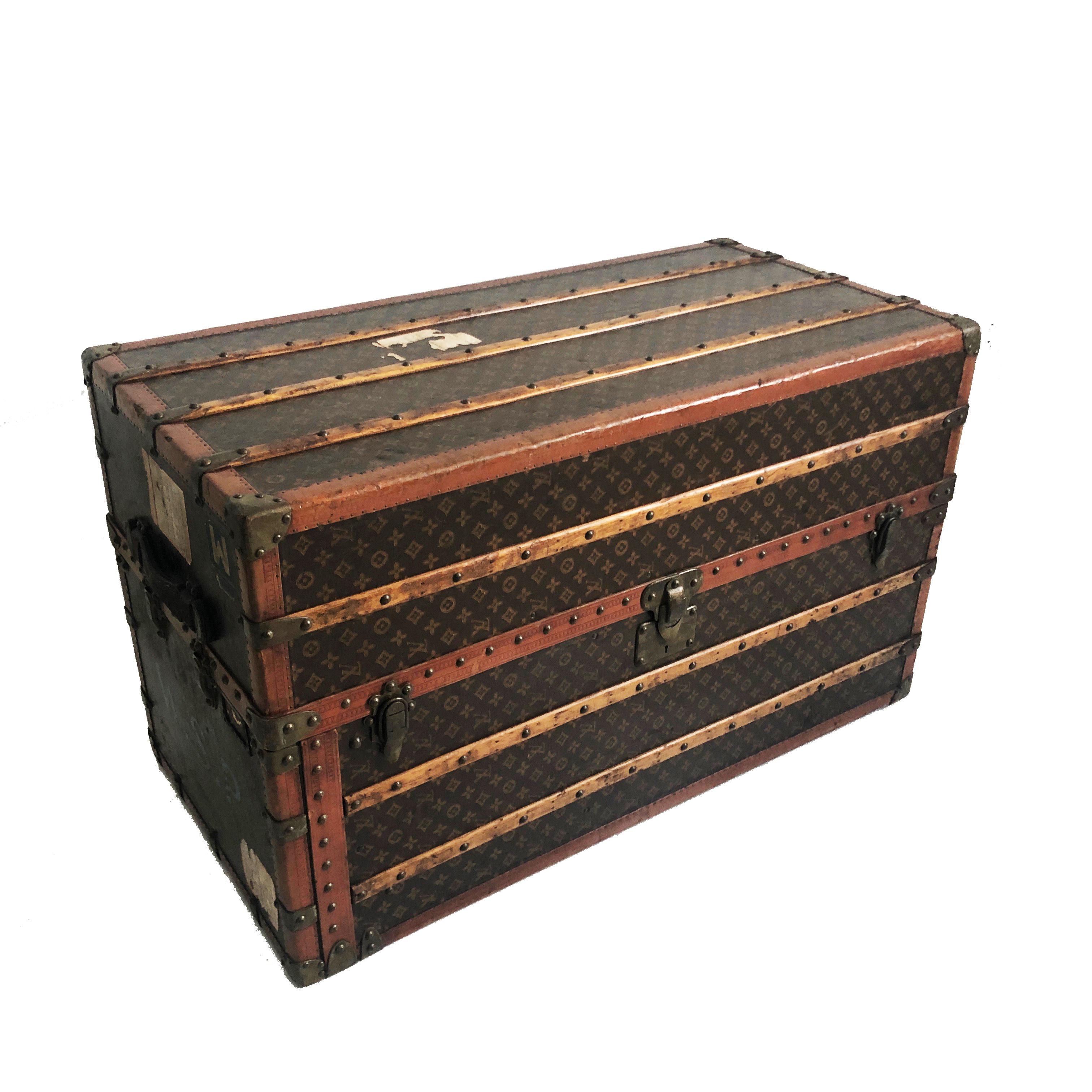 An impressive Louis Vuitton Large Wardrobe Steamer Trunk Travel Case from the early 20th C.  Made from Vuitton's monogram canvas, the interior features 6 drawers, 8 full hangers, 3 pant hangers, 1 cloth screen and a removable velveteen lined storage