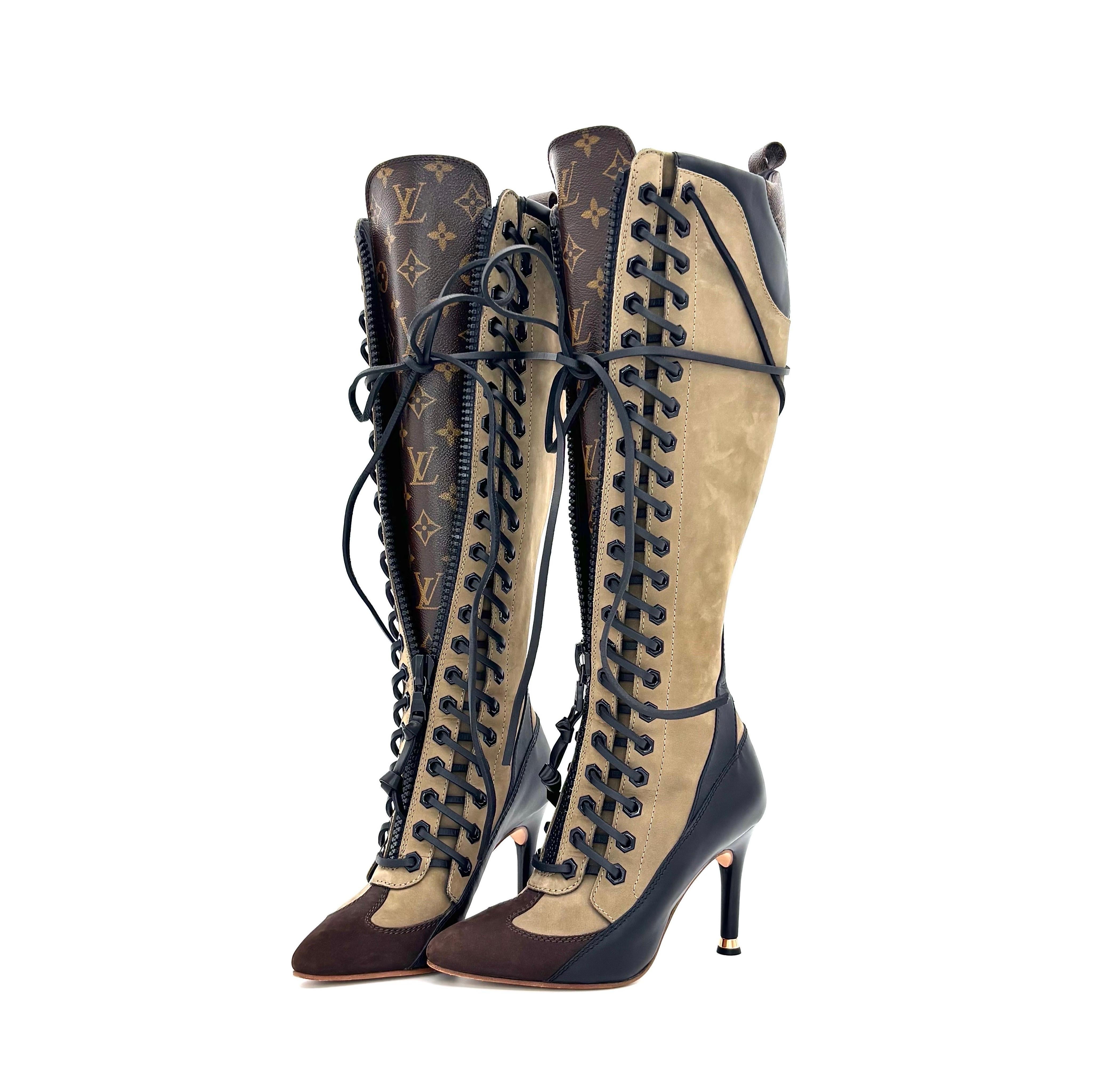Louis Vuitton Laureate High Boots 

Color Multi
Size 36.5EU
Leather upper
Leather laces
Pointed toe
LV signature printed tongue
High stiletto heel with gold capped base
3.5in heel height

Includes original dustbags
Signs of normal use, very good