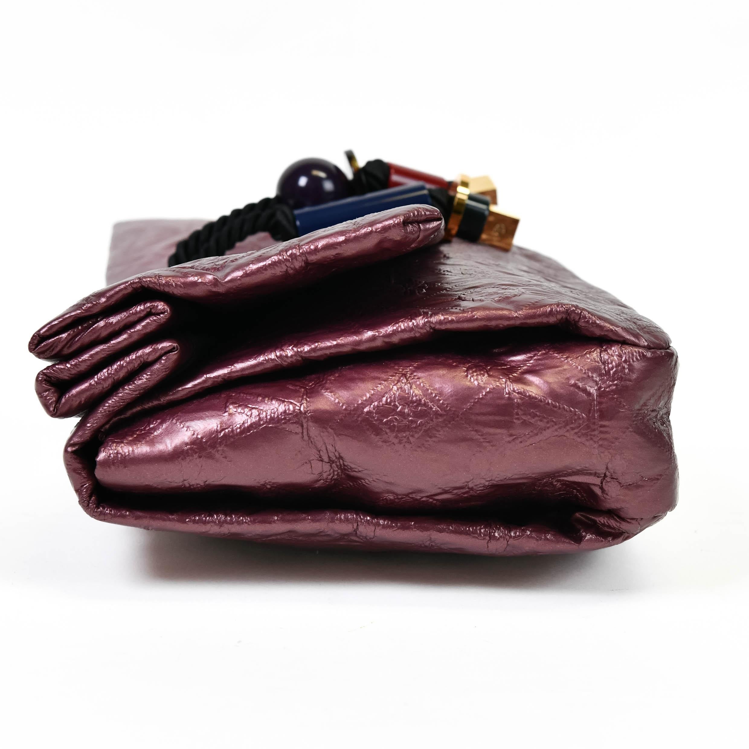 Afrikanische Königin-Clutch aus gestepptem Jacquard in Lavendel mit Monogramm aus Limelight von Louis Vuitton 1