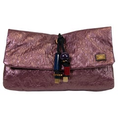 Afrikanische Königin-Clutch aus gestepptem Jacquard in Lavendel mit Monogramm aus Limelight von Louis Vuitton