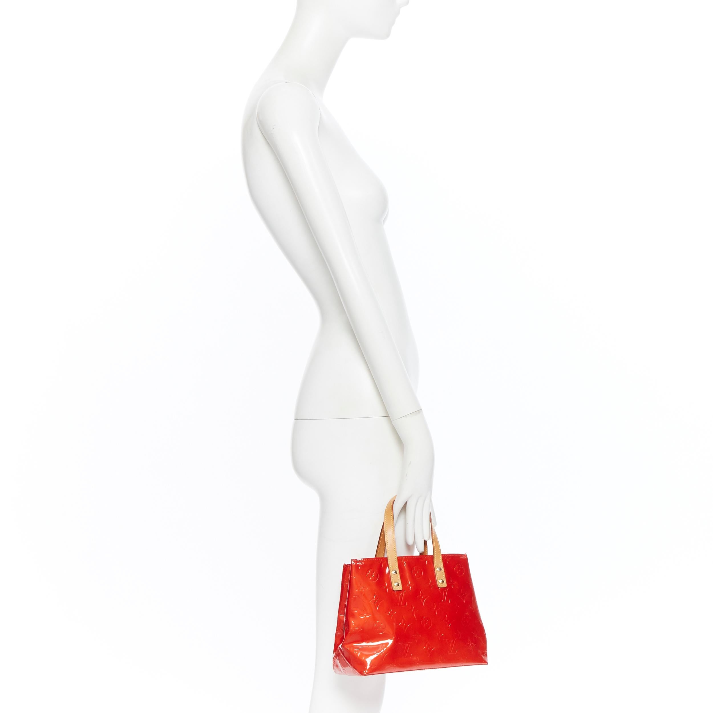 LOUIS VUITTON Lead PM Vernis red monogram embossed small satchel tote bag
Brand: Louis Vuitton
Designer: Marc Jacobs
Model Name / Style: Lead PM
Material: Patent leather
Color: Red
Pattern: Solid
Extra Detail: Double Handles.
Made in: