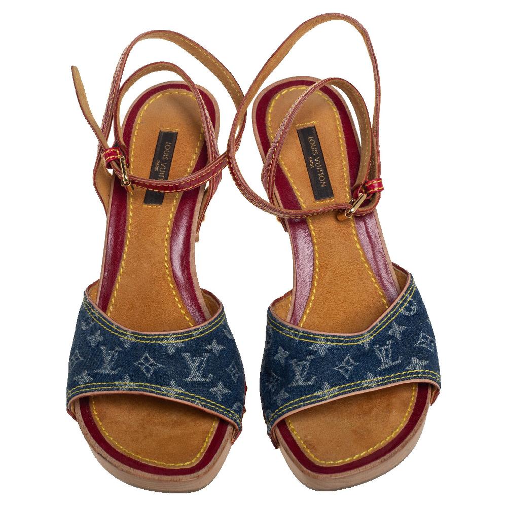 These stunning sandals by Louis Vuitton are a perfect example of the brand's fine craftsmanship. Crafted from leather and monogrammed denim, they come with simple vamps, ankle straps, and comfortable heels.

Includes: Original Dustbag, Original Box