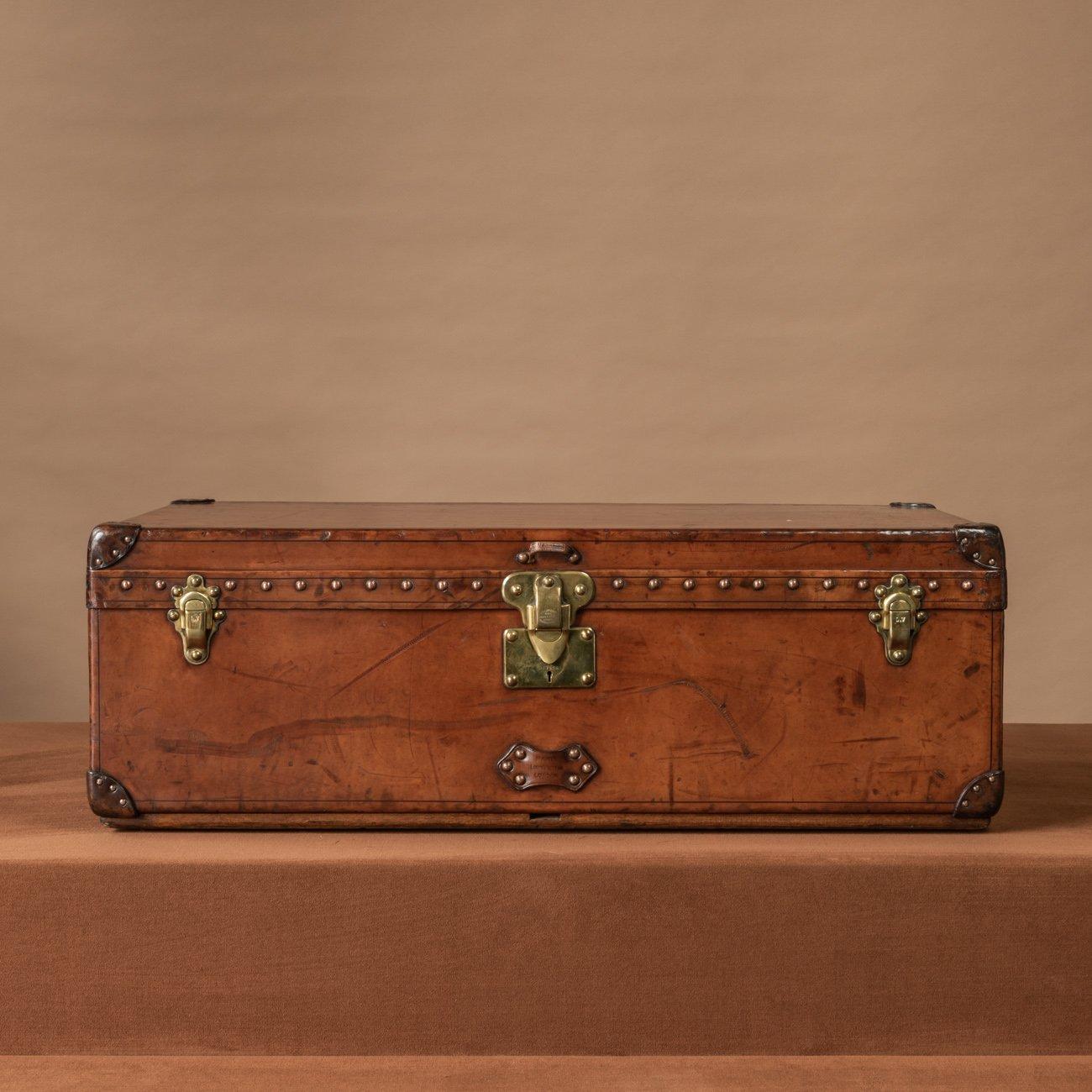 A well proportioned natural leather covered Louis Vuitton cabin trunk that has built up a rich colour and attractive patina with age. Has original leather handles & brass fittings and has its original interior in-tact (including the original tray);