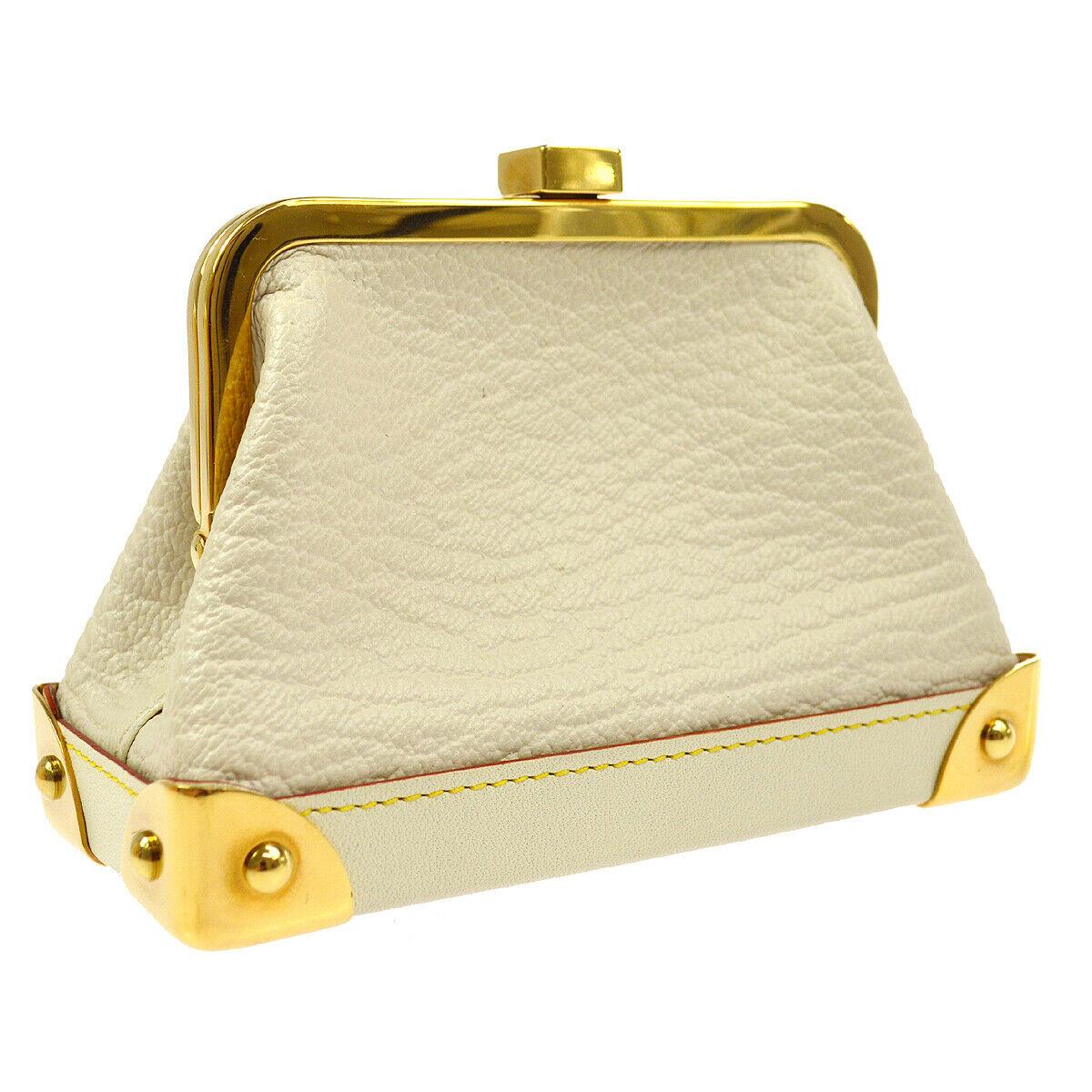 Louis Vuitton Leather Gold Small Mini Top Handle Kisslock Cosmetic Bag in Box 

Leather
Gold tone hardware
Leather lining
Kisslock closure
Date code present
Made in France
Measures 4.75