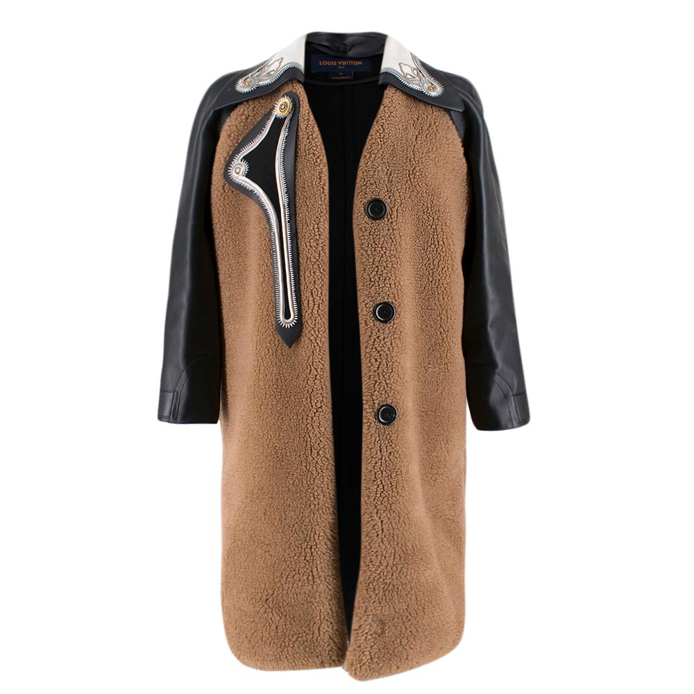 Louis Vuitton Wool Teddy bear Coat with Leather Sleeves

- brown wool teddy bear coat 
- Oversize fit
- black leather sleeves and collar
- white wool collar embellished with leather details
- double sided chest detail that can be fixed under