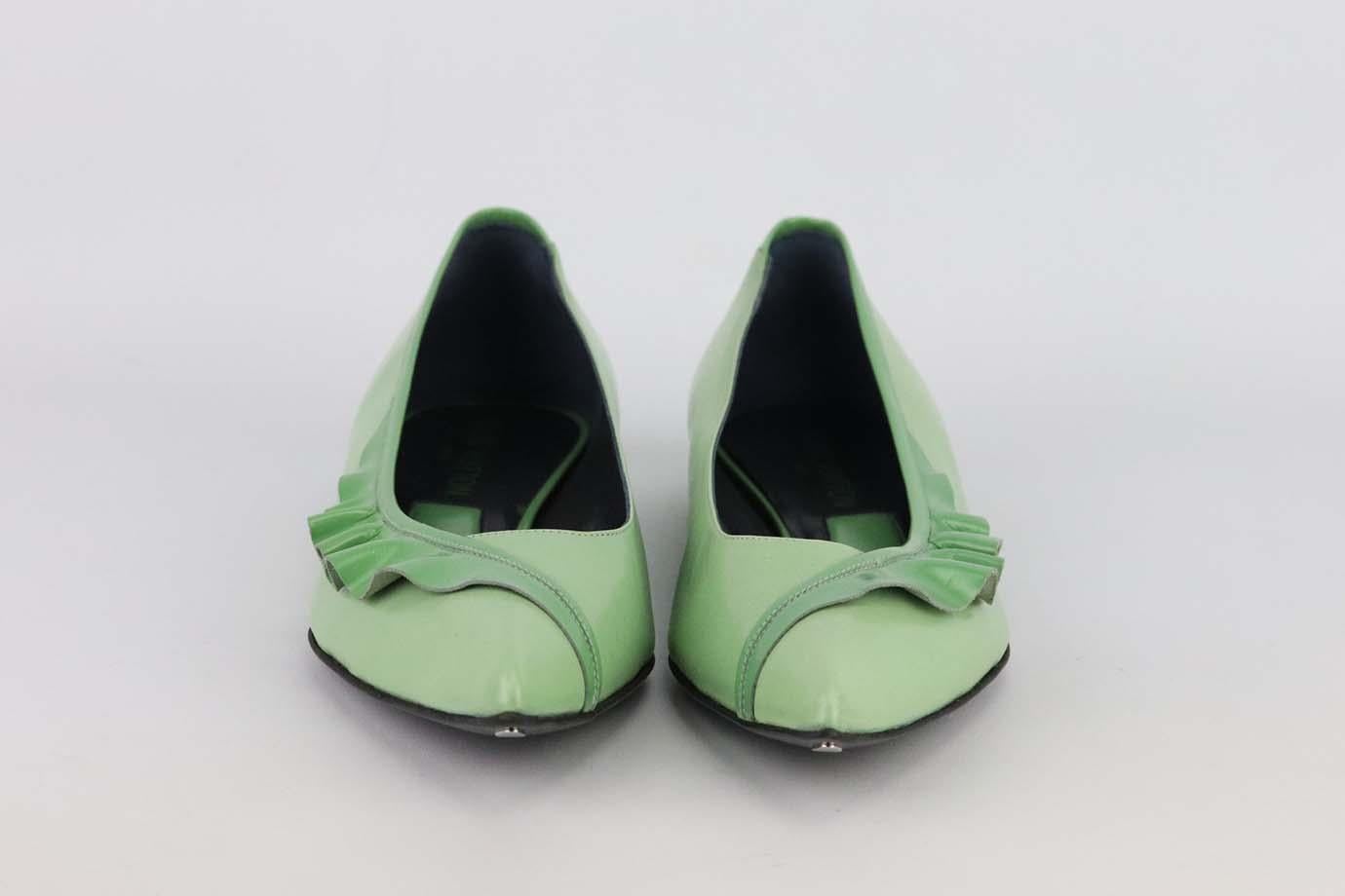 These ballerina flats by Louis Vuitton are a classic style that will never date, made in Italy from green leather, they have sharp pointed toes with ruffle trim. Heel measures approximately 10 mm/ 0.4 inches. Green leather. Slips on. Does not come