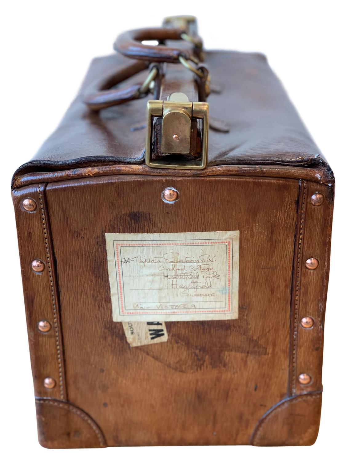 A rare Louis Vuitton Gladstone Travel case, circa 1910 made from grained leather, with details of natural cowhide and morocco leather. Bags of this age are exceptionally rare and have almost certainly been restored and relined. This bag is all