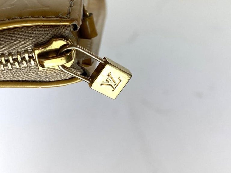 Louis Vuitton Lexington Pochette Accesoires Monogram Wristlet