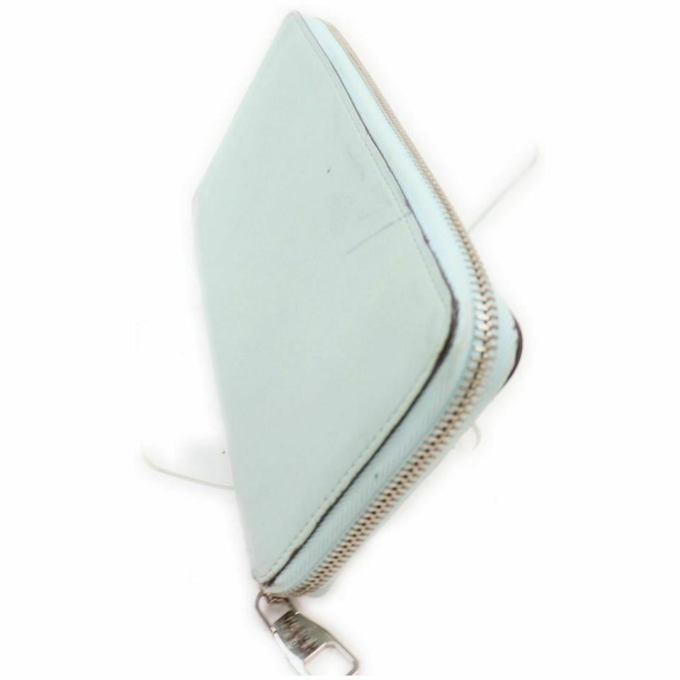 Louis Vuitton Light Blue Leather Articles de Voyage Zippy Wallet Zip Around In Good Condition For Sale In Dix hills, NY