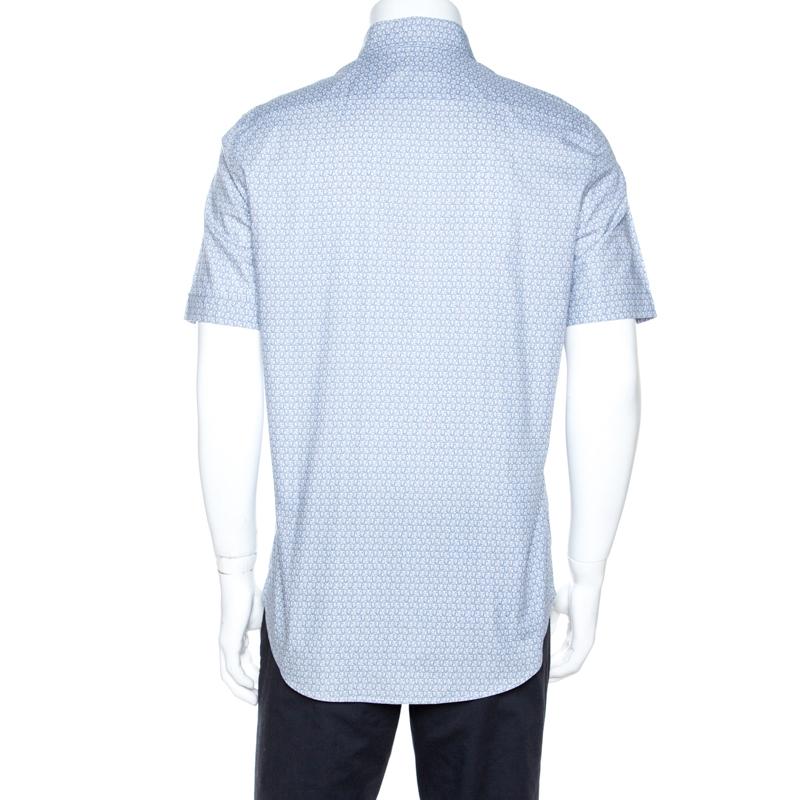 Deliver a polished look every time you step out in this smart Louis Vuitton shirt. It has been designed to offer comfort and a signature look that will set you apart from the crowds. It is crafted from 100% cotton that is breathable. It carries a