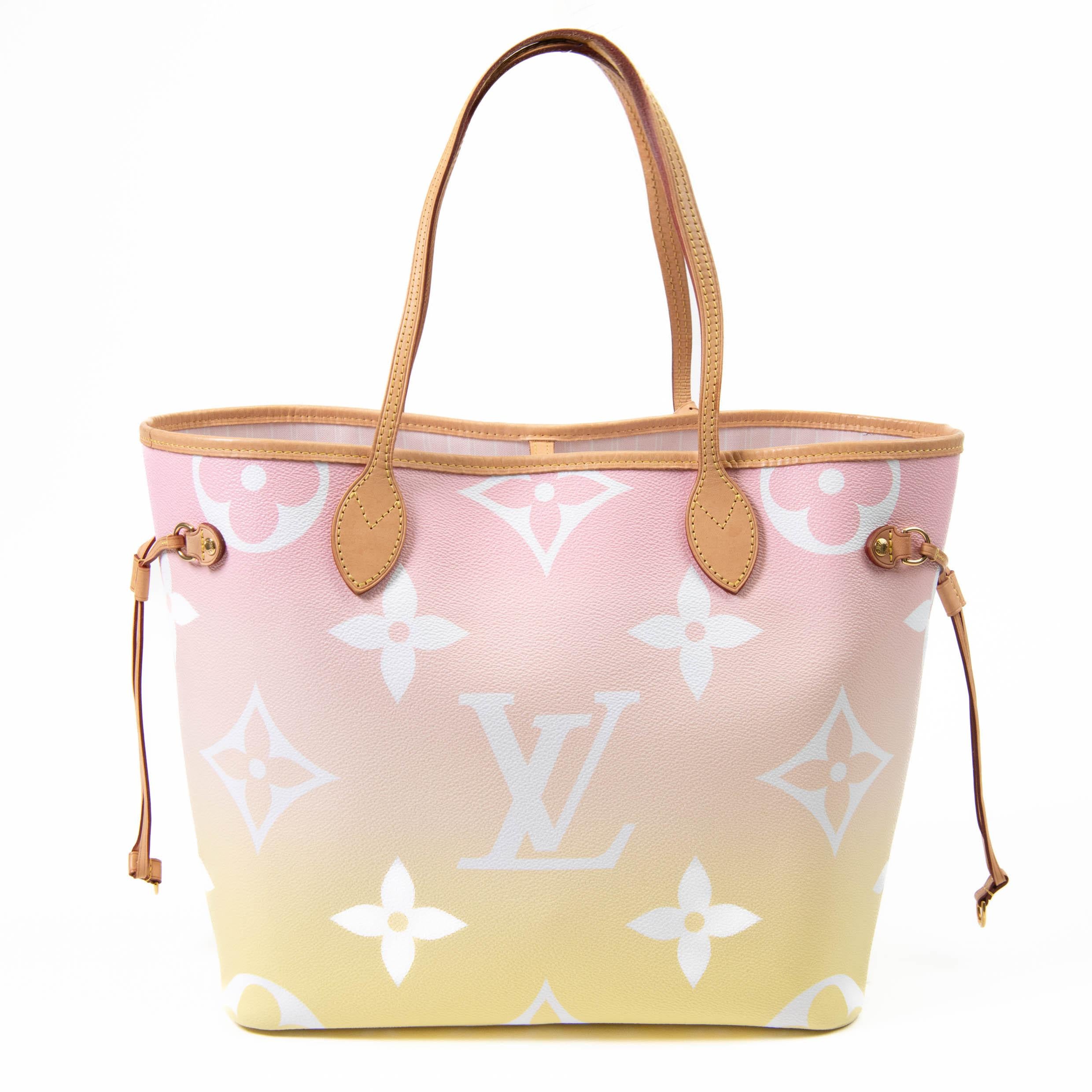 100% Authentic 

 This chic tote features oversized Louis Vuitton monogram print on coated canvas in a pink and yellow ombre effect and features a vachetta leather strap handles and side cinch straps. The top opens to a spacious pink striped fabric