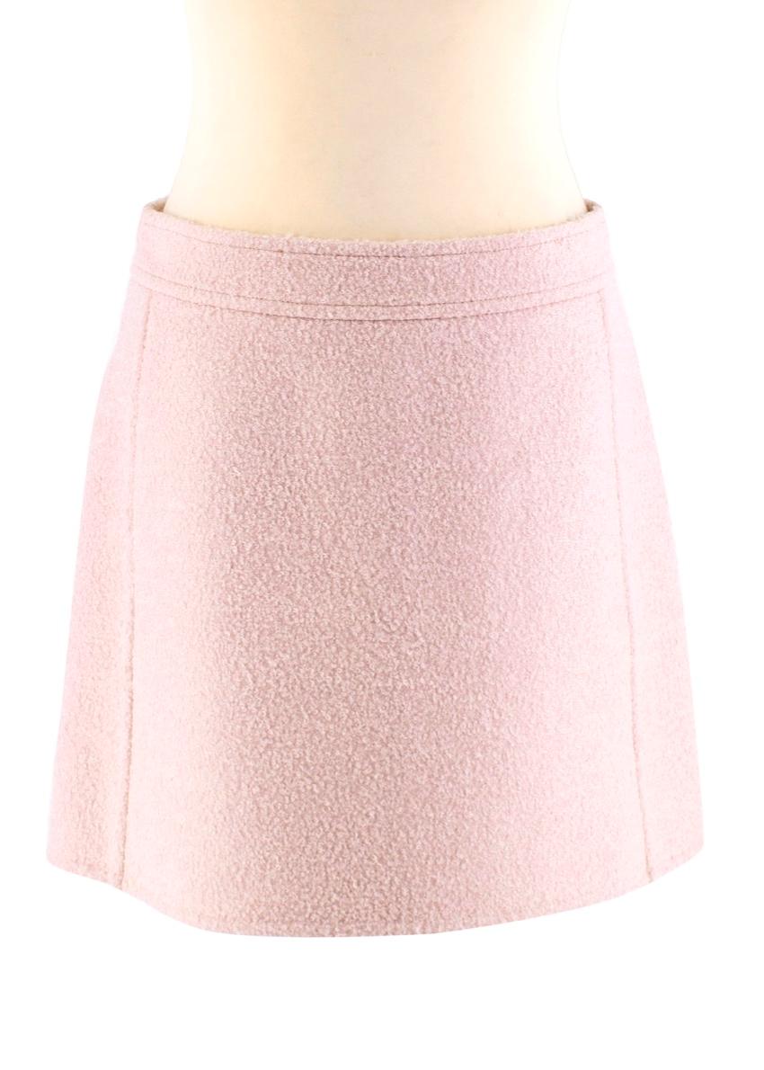 Louis Vuitton Light Pink Wool blend Skirt Suit 

-Soft wool and lama texture 
-Branded tag to the pocket 
-Gorgeous light pink hue 
-Round neckline 
-Branded button fastening to the front 
-3 pockets to the front 
-V shaped panel to the back