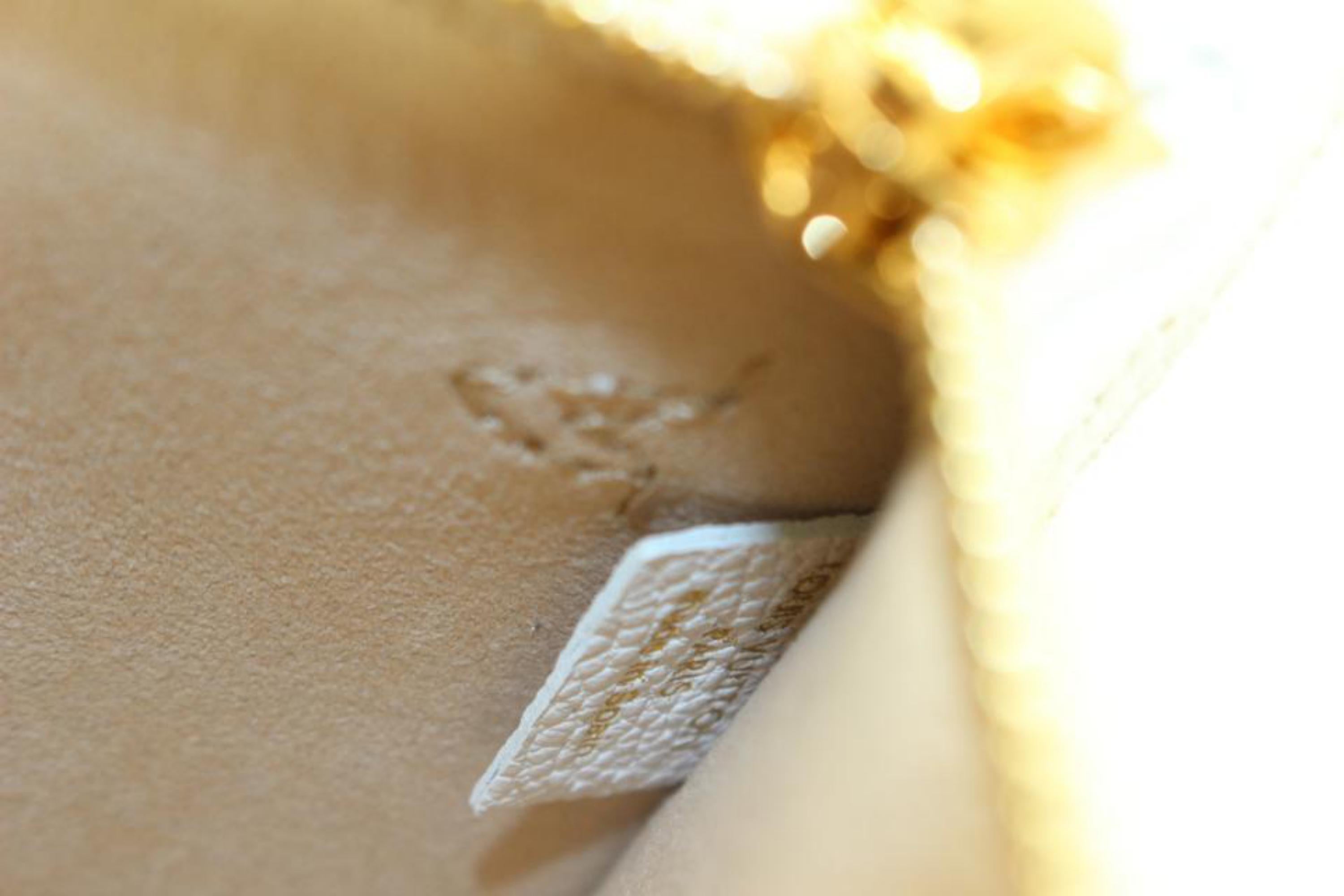 Louis Vuitton - Pochette beige Empreinte Neverfull avec monogramme, édition limitée, MM ou GM 46lk3 Pour femmes en vente