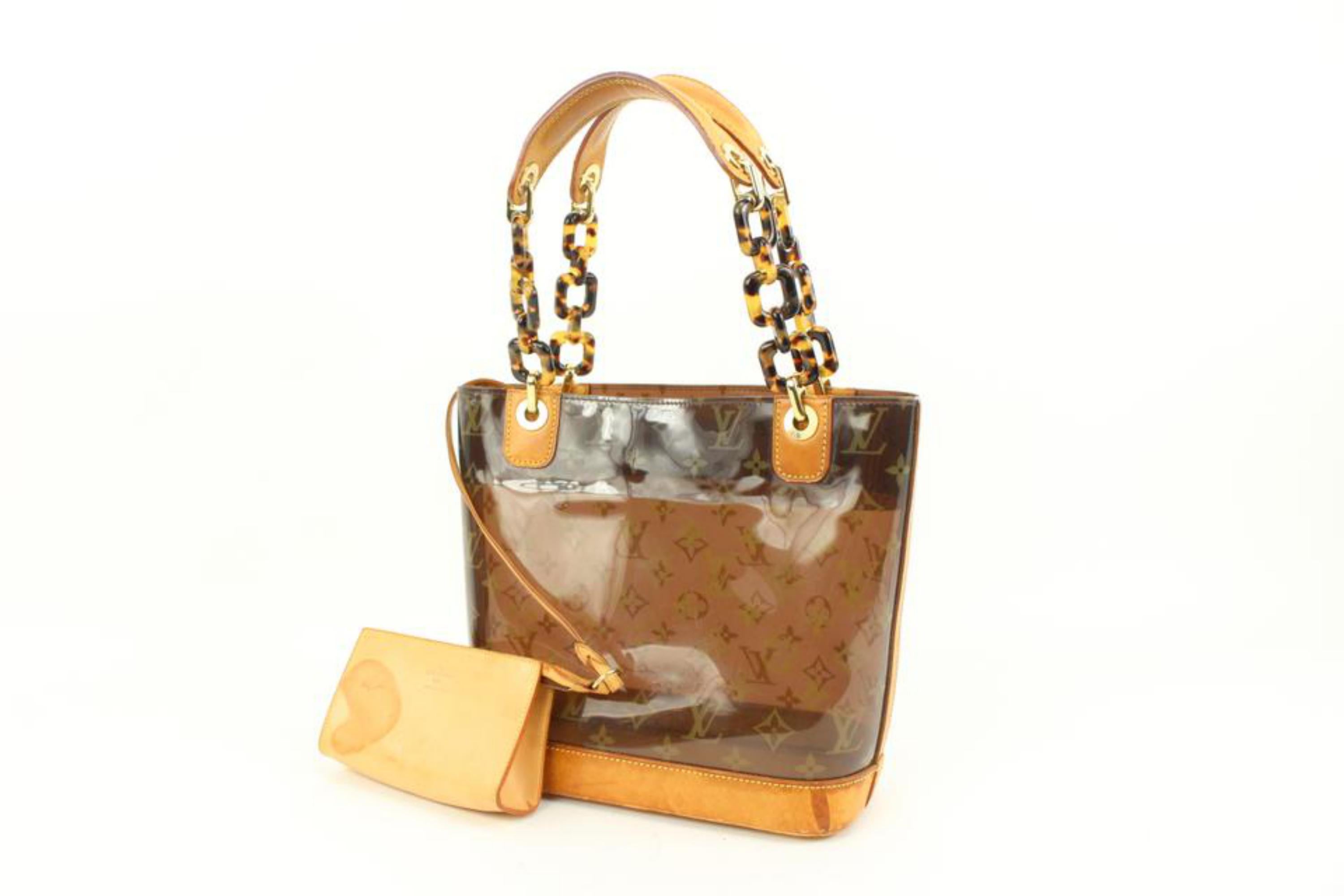 Louis Vuitton Limited Clear Monogram Cabas Sac Ambre PM Tote with Pouch 97lk425s
Date Code/Serial Number: LM0023
Made In: Spain
Measurements: Length:  11
